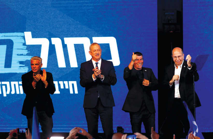 BLUE AND WHITE Party leader Benny Gantz stands next to Moshe Ya’alon, Yair Lapid and Gaby Ashkenazi in Tel Aviv following the announcement of exit polls on Monday night. (photo credit: RONEN ZVULUN/REUTERS)