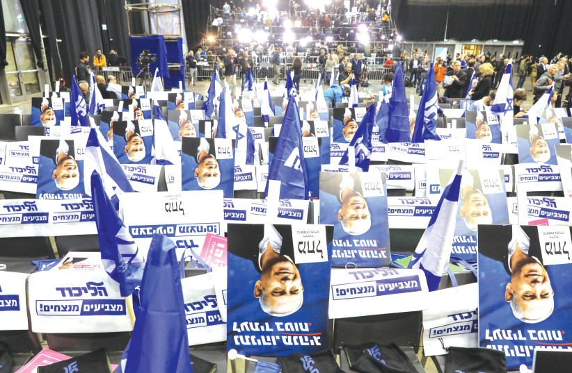 IKUD HEADQUARTERS on Monday night, getting ready to celebrate ahead of the exit polls. (photo credit: MARC ISRAEL SELLEM/THE JERUSALEM POST)
