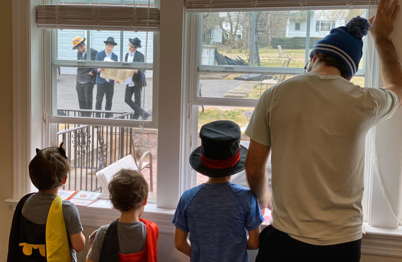 People in Westchester County, New York, listen to megillah reading from inside their homes. (photo credit: Courtesy)