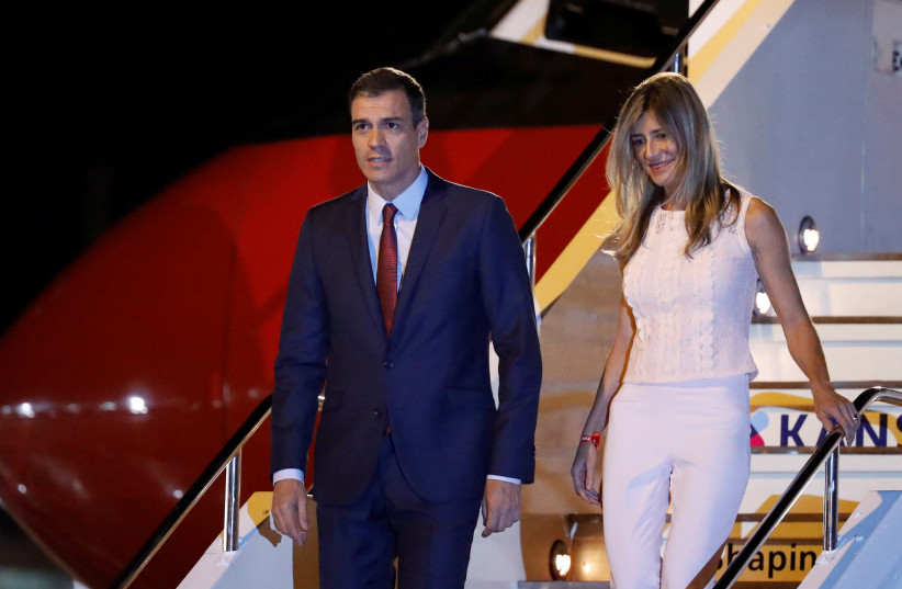 FILE PHOTO: Spain's Prime Minister Pedro Sanchez and his wife Maria Begona Gomez Fernandez arrive ahead of the G20 leaders summit in Osaka, Japan June 27, 2019 (credit: REUTERS/JORGE SILVA/FILE PHOTO)