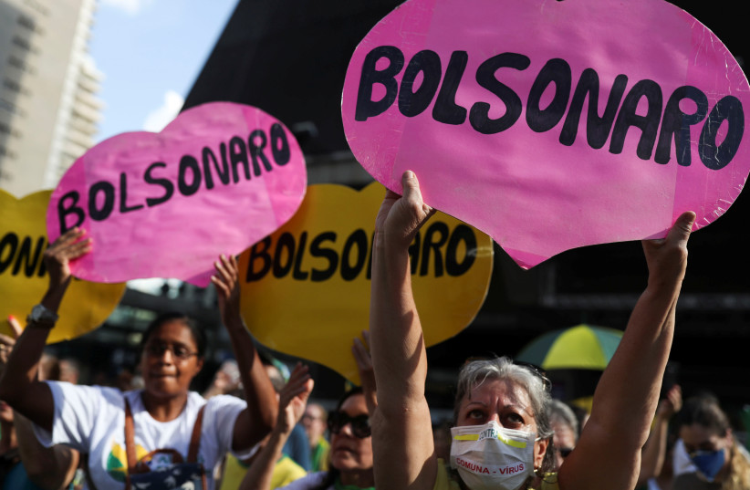 Supporters of Brazilian President Jair Bolsonaro demonstrate against Congress and Supreme Court  (photo credit: REUTERS/AMANDA PEROBELLI)