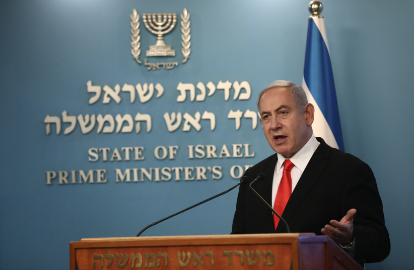 Prime Minister Benjamin Netanyahu addresses the nation regarding new emergency measures brought in to combat the coronavirus outbreak, March 16, 2020 (photo credit: YONATAN SINDEL/FLASH 90)