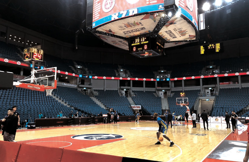 EMPTY BASKETBALL ARENAS and soccer stadiums have become the new norm across Israel and the rest of the world in the face of coronavirus concerns, with no indication of when the games will resume. (photo credit: DOV HALICKMAN PHOTOGRAPHY)