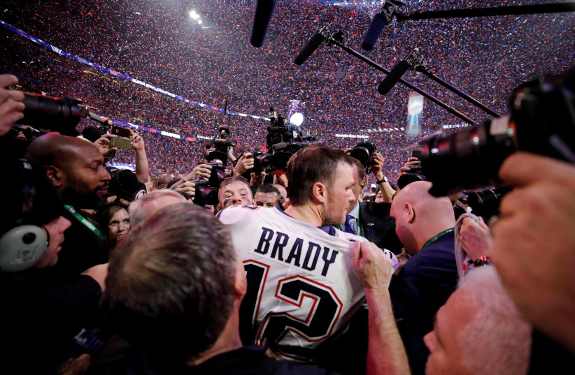 New England Patriots' Tom Brady celebrates winning the Super Bowl LIII.  (photo credit: REUTERS)