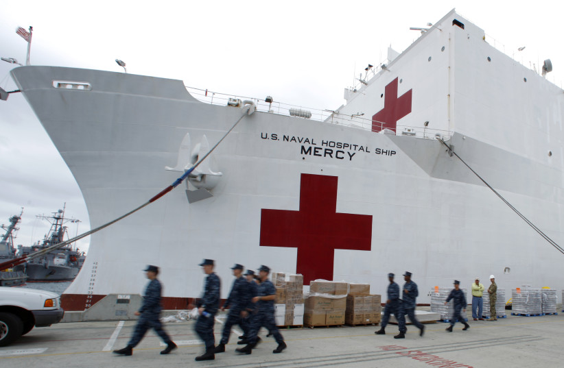 San Diego-based hospital ship USNS Mercy prepares for possible deployment to aid the typhoon-stricken areas of the Philippines from its port in San Diego, California November 15, 2013. (photo credit: MIKE BLAKE/ REUTERS)