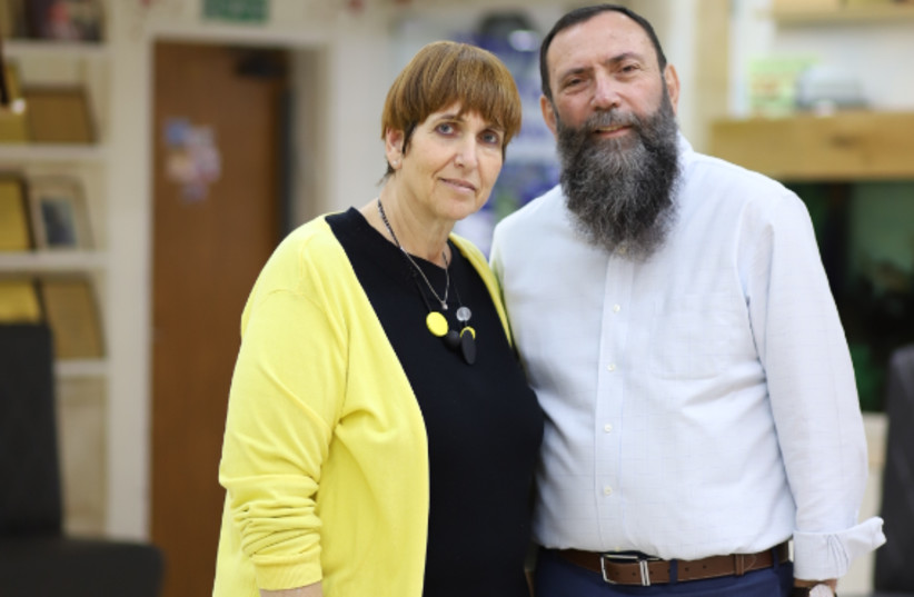 Yehuda Kohn WITH HIS wife (credit: ALIZA SHTAUBER)