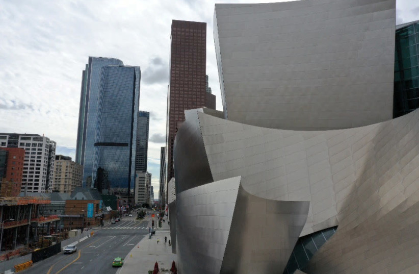 A general view of downtown Los Angeles and the Walt Disney Concert Hall the day after California issued a stay-at-home order due to coronavirus disease (COVID-19) in Los Angeles (photo credit: LUCY NICHOLSON / REUTERS)