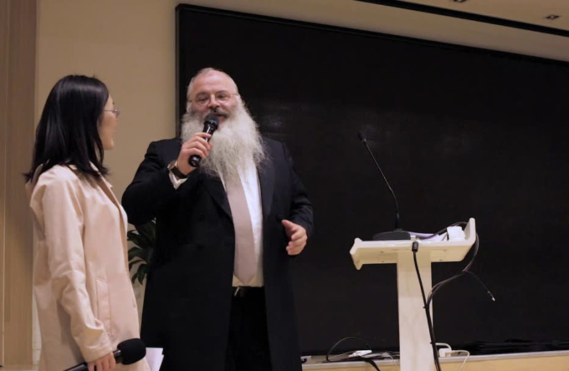 Rabbi Shimon Freundlich speaking at Family Hospital in Beijing, China in 2018 (photo credit: COURTESY OF CHABAD CHINA/JTA)