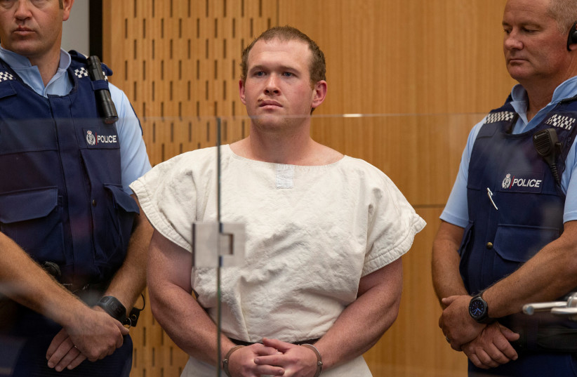 Brenton Tarrant, charged for murder in relation to the mosque attacks, is seen in the dock during his appearance in the Christchurch District Court, New Zealand March 16, 2019 (photo credit: MARK MITCHELL/NEW ZEALAND HERALD/POOL VIA REUTERS)