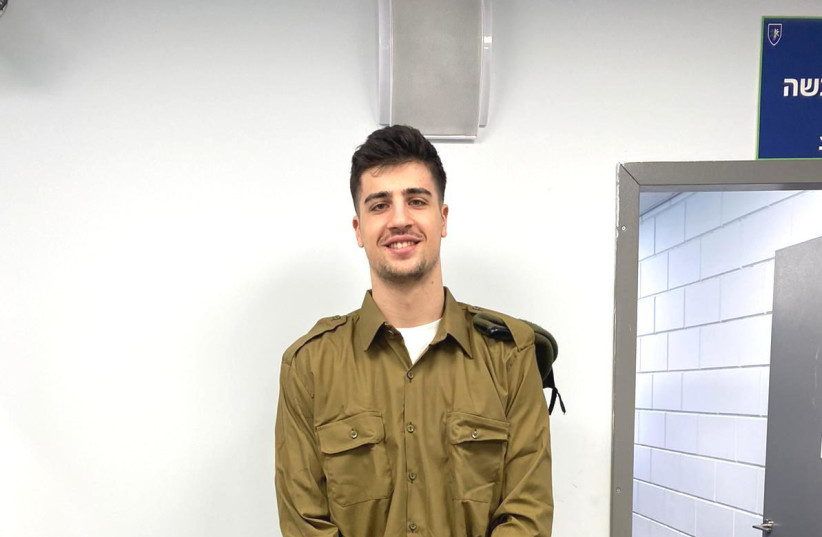 MACCABI TEL AVIV and Israel National Team forward Deni Avdija poses in his IDF uniform after being drafted yesterday (photo credit: Courtesy)