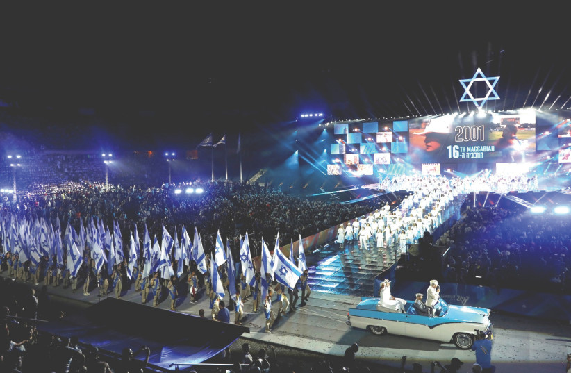 DELEGATIONS FROM 85 countries gather at Teddy Stadium in Jerusalem for the opening ceremony of the 2017 Maccabiah Games (photo credit: REUTERS)