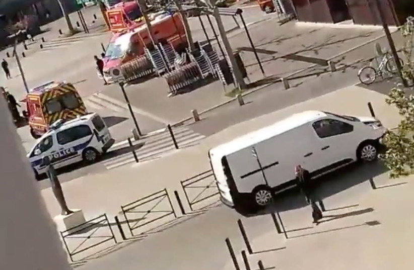 Emergency services arrive on a scene of a knife attack in Romans-sur-Isere near Lyon, France April 4, 2020 in this screen grab obtained from a social media video (photo credit: TWITTER/@IMYURIKA_ /VIA REUTERS)