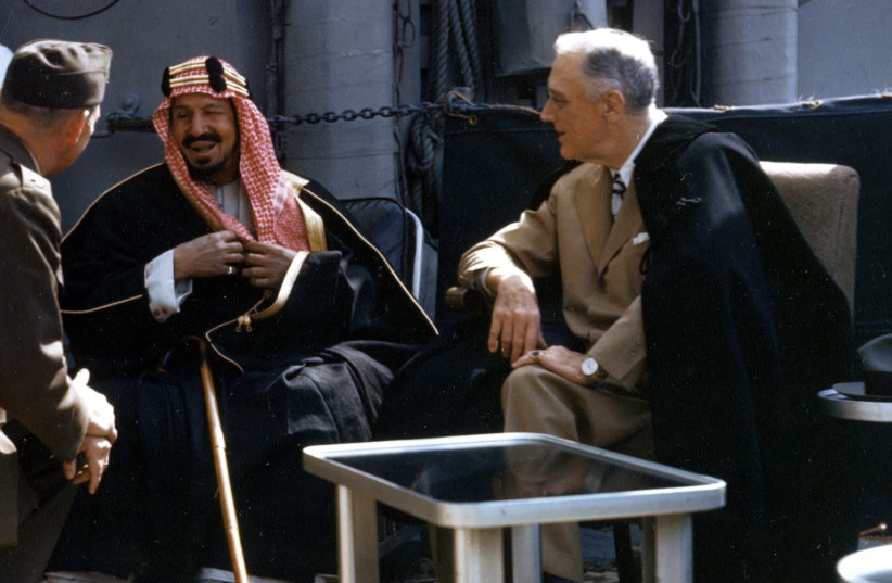 US President Franklin D. Roosevelt meets with King Ibn Saud of Saudi Arabia, on board the U.S. Navy heavy cruiser USS Quincy (CA-71) in the Great Bitter Lake, Egypt, on 14 February 1945 (photo credit: COURTESY U.S. NAVAL HISTORY AND HERITAGE COMMAND/U.S. NAVY/HANDOUT VIA REUTERS)