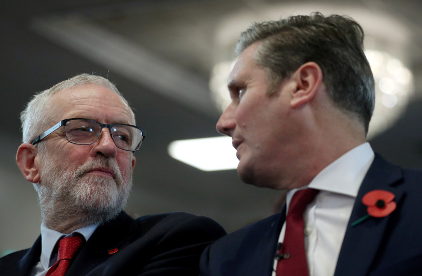 Jeremy Corbyn and Keir Starmer attend a general election campaign meeting in Harlow, Britain November 5, 2019 (photo credit: REUTERS / HANNAH MCKAY)