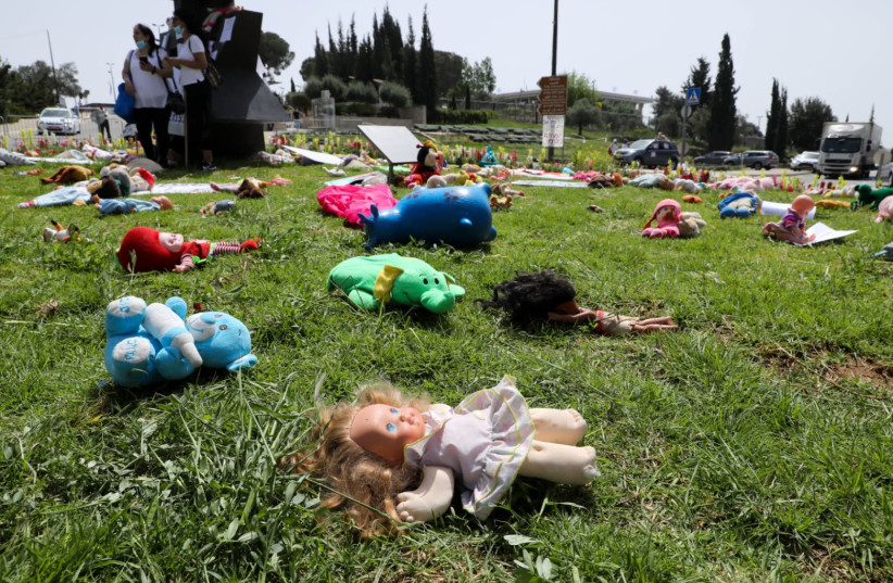 Israeli parents initiate a protest calling to re-open kindergartens and daycares occurred outside the Knesset in Jerusalem on Wednesday. (photo credit: MARC ISRAEL SELLEM/THE JERUSALEM POST)