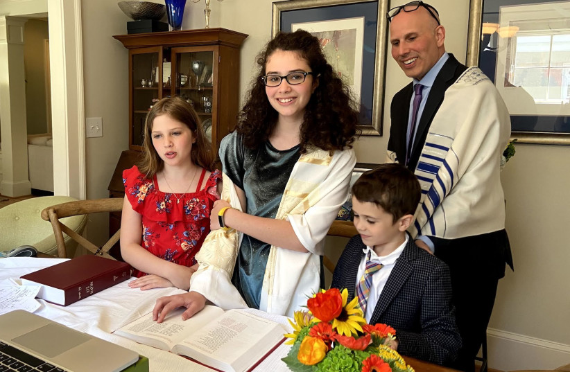 Lila Duke celebrated her bat mitzvah at home as more than 100 guests tuned in on Zoom (photo credit: COURTESY OF THE DUKE FAMILY/JTA)