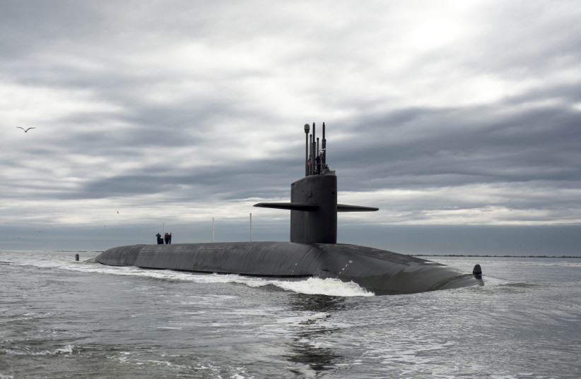 The Ohio-class ballistic missile submarine USS Tennessee returns to Naval Submarine Base Kings Bay, Georgia (credit: REUTERS/MASS COMMUNICATION SPECIALIST 1ST CLASS JAMES KIMBER/U.S. NAVY/HANDOUT VIA REUTERS)