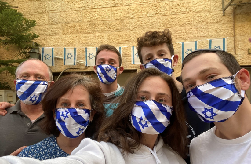 Coronavirus face masks in the pattern of the Israeli flag (photo credit: NINA BRODER)
