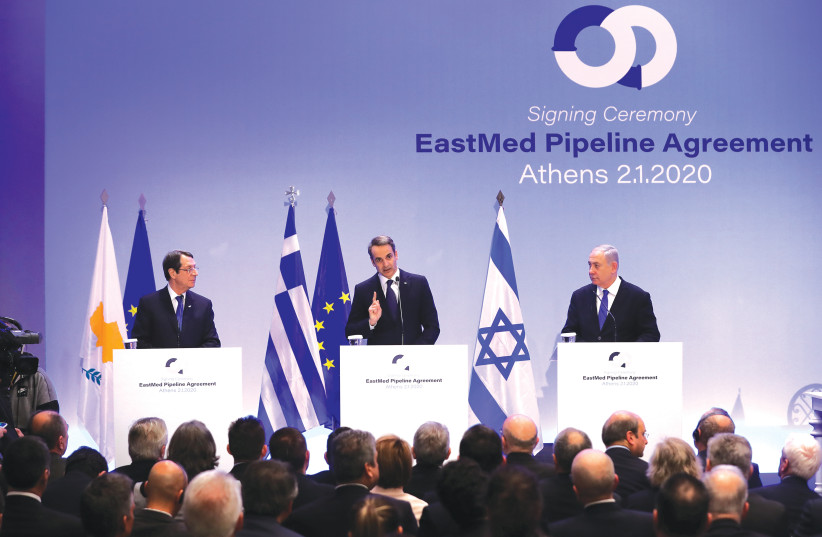 CYPRIOT PRESIDENT Nicos Anastasiades, Greek Prime Minister Kyriakos Mitsotakis and Prime Minister Benjamin Netanyahu attend a joint news conference following the signing of a deal to build the EastMed sub-sea pipeline to carry natural gas from the eastern Mediterranean to Europe, in Athens earlier t (credit: REUTERS)