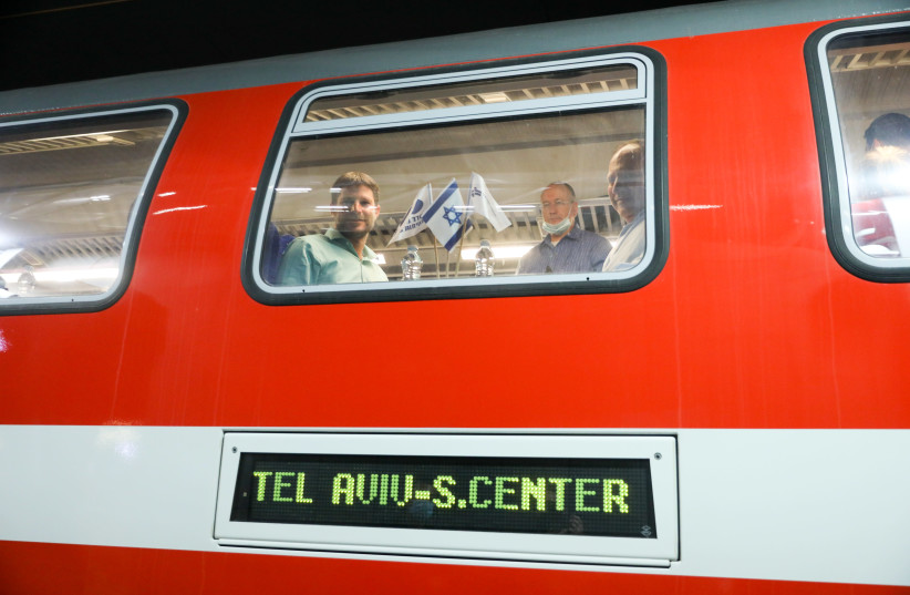 Transportation Minister Bezalel Smotrich and Israel Railways CEO Michael Maixner inaugurate the extended Jerusalem-Tel Aviv Savidor Central railway (credit: MARC ISRAEL SELLEM)