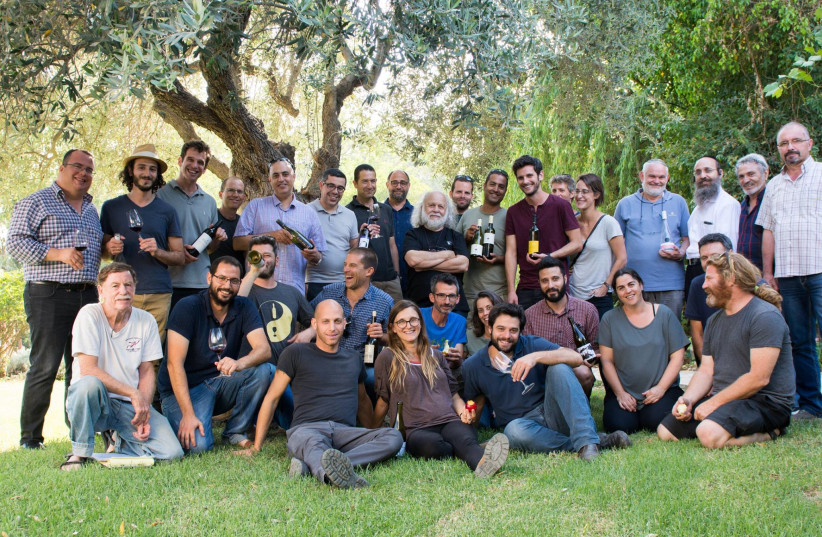 THE CREAM of Israeli winemakers and viticulturists relaxing after a meeting. (photo credit: IPEVO)