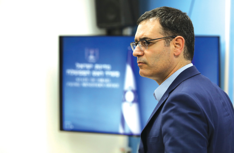 OUTGOING HEALTH Ministry director-general Moshe Bar Siman Tov appears at a press briefing at the Prime Ministers office last month (credit: FLASH90)