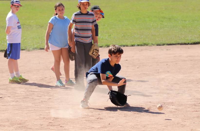Kids play softball at Camp Ramah in California. The camp will face a significant shortfall if it needs to refund all of its tuition this year. (credit: RAMAH IN CALIFORNIA)