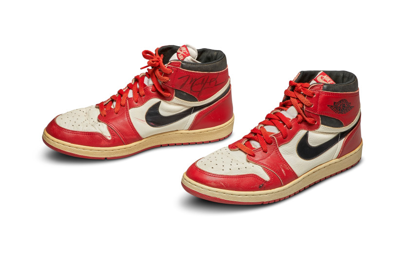 A pair of 1985 Nike Air Jordan 1s, made for and worn by US basketball player Michael Jordan (photo credit: REUTERS)