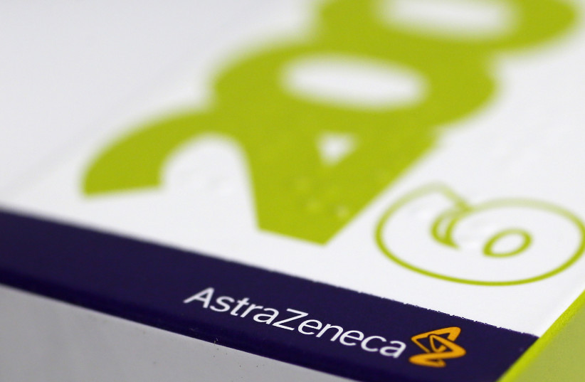 The logo of AstraZeneca is seen on a medication package in a pharmacy in London April 28, 2014 (photo credit: STEFAN WERMUTH/REUTERS)