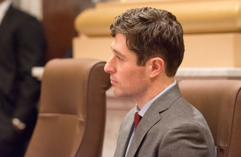 Minneapolis Mayor Jacob Frey listens to the first organizing meeting of the newly-elected Minneapolis City Council body. (photo credit: Wikimedia Commons)