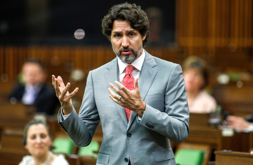 Canada's Prime Minister Justin Trudeau speaks during a meeting of the special committee on the COVID-19 outbreak, as efforts continue to help slow the spread of the coronavirus disease (COVID-19), in the House of Commons on Parliament Hill in Ottawa, Ontario, Canada May 20, 2020 (photo credit: REUTERS//BLAIR GABLE)