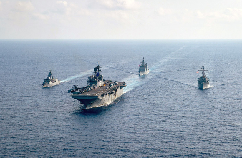 US Navy and Royal Australian Navy team up in the South China Sea (credit: REUTERS)