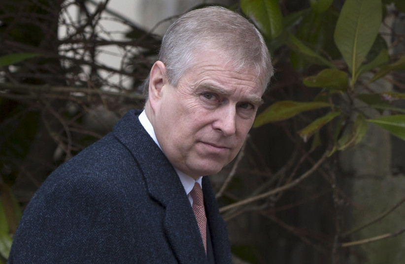 Britain's Prince Andrew leaves after attending the Easter Sunday service at St Georges Chapel at Windsor Castle in southern England April 5, 2015.  (photo credit: REUTERS/NEIL HALL)