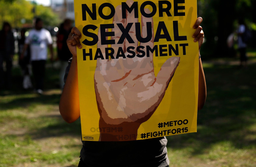 A sign from a protest against sexual harassment in the workplace in Chicago, Sept. 18, 2018.  (photo credit: JOSHUA LOTT/AFP VIA GETTY IMAGES)