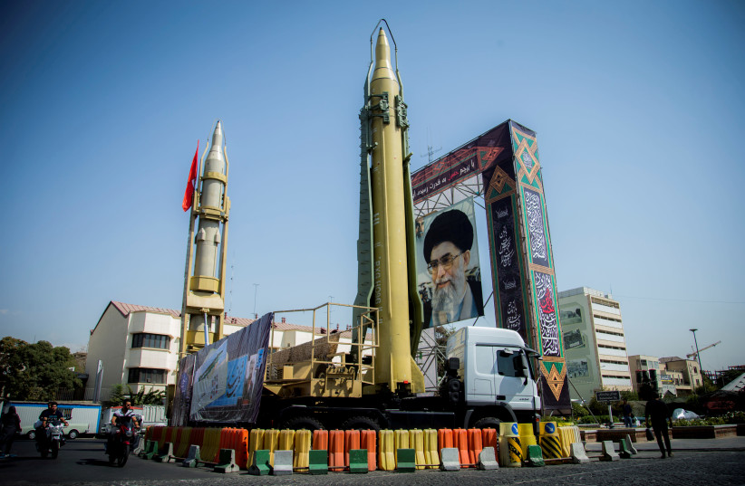 A display featuring missiles and a portrait of Iran's Supreme Leader Ayatollah Ali Khamenei is seen at Baharestan Square in Tehran, Iran September 27, 2017 (credit: NAZANIN TABATABAEE YAZDI/ TIMA VIA REUTERS)