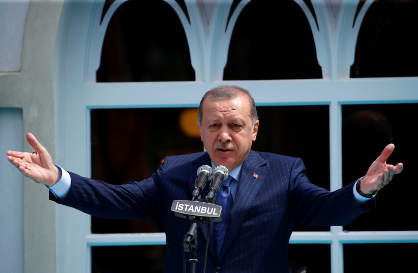 Turkish President Tayyip Erdogan makes a speech during the re-opening of the Ottoman-era Yildiz Hamidiye mosque in Istanbul, Turkey, August 4, 2017 (photo credit: MURAD SEZER/REUTERS)