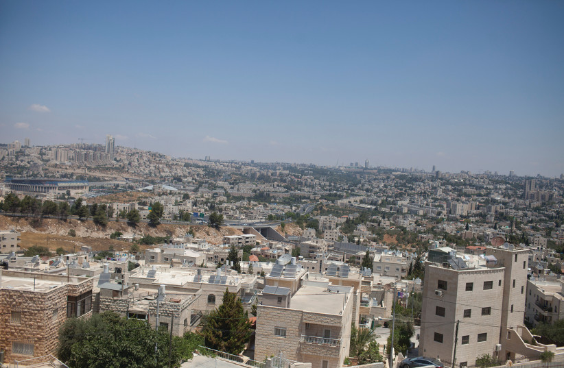 HOUSES in the Beit Safafa neighborhood of Jerusalem, near Givat Hamatos. (photo credit: LIOR MIZRAHI/FLASH90)