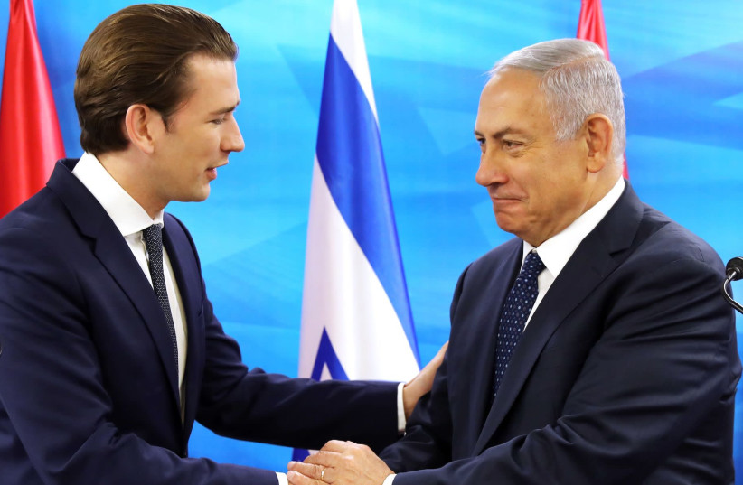Austrian Chancellor Sebastian Kurz, left, with Israeli Prime Minister Benjamin Netanyahu at a joint news conference in Jerusalem, June 11, 2018 (credit: AMMAR AWAD/AFP VIA GETTY IMAGES/JTA)