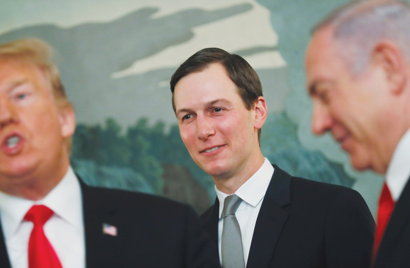 JARED KUSHNER, senior adviser to the president, listens to US President Donald Trump speak with Prime Minister Benjamin Netanyahu at the White House last year. (photo credit: CARLOS BARRIA / REUTERS)