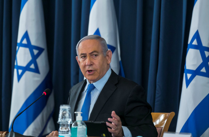 Prime Minister Benjamin Netanyahu attends the government cabinet meeting, June 28, 2020 (photo credit: OLIVIER FITOUSSI/FLASH90)