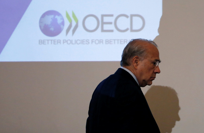 OECD Secretary General Jose Angel Gurria attends a news conference at the Japan National Press Club in Tokyo, Japan April 13, 2017. (photo credit: REUTERS/TORU HANAI)