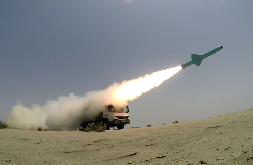 An Iranian locally made cruise missile is fired during war games in the northern Indian Ocean and near the entrance to the Gulf, Iran June 17, 2020 (photo credit: WANA NEWS AGENCY/REUTERS)