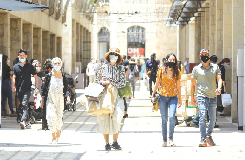 SHOPPERS AT the Mamilla mall in Jerusalem this week. What would the country look like if missiles were falling?  (credit: MARC ISRAEL SELLEM/THE JERUSALEM POST)