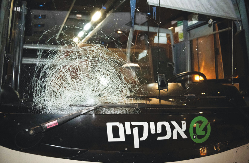 SHATTERED GLASS spiders across a bus windshield hit by stones, on route 55 near Emmanuel in January (photo credit: SRAYA DIAMANT/FLASH90)