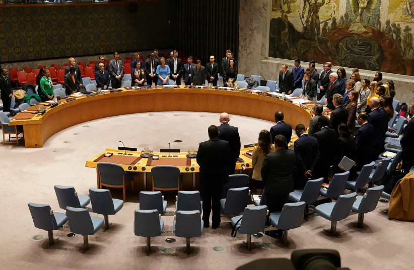 Members of the United Nations Security Council observe a moment of silence at the beginning of a meeting about Afghanistan at United Nations Headquarters in the Manhattan borough of New York City, New York, U.S., March 10, 2020 (photo credit: REUTERS/CARLO ALLEGRI)