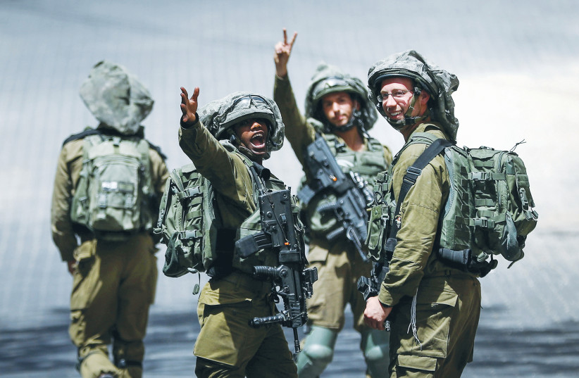 ISRAELI SOLDIERS patrol in Hebron, June 2020 (photo credit: WISAM HASHLAMOUN/FLASH90)