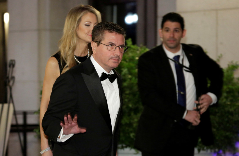 Dan Snyder, owner of the Washington Redskins football team, arrives to attend a candlelight dinner with President-elect Donald Trump at Union Station in Washington, U.S., January 19, 2017. (photo credit: REUTERS/JOSHUA ROBERTS)