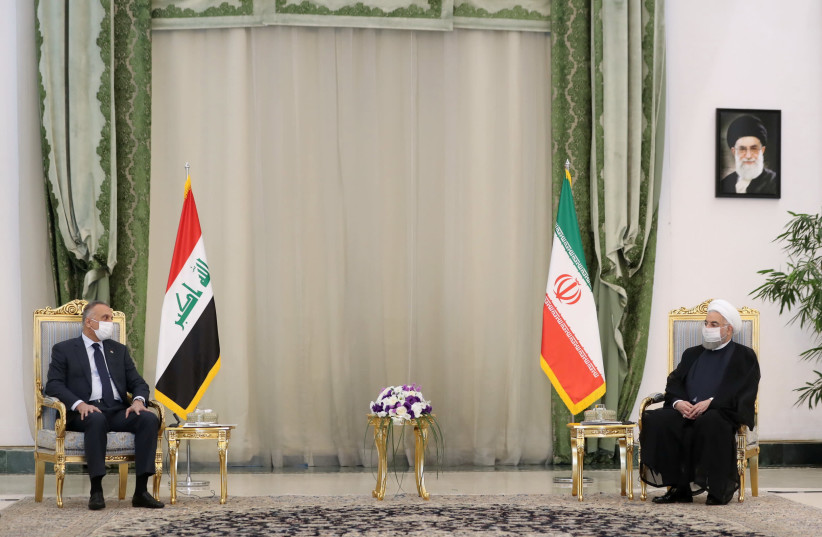 Iran's Supreme Leader Ayatollah Ali Khamenei meets with Iraqi Prime Minister Mustafa al-Kadhimi as they wear protective masks, in Tehran, Iran, July 21, 2020. (photo credit: REUTERS)