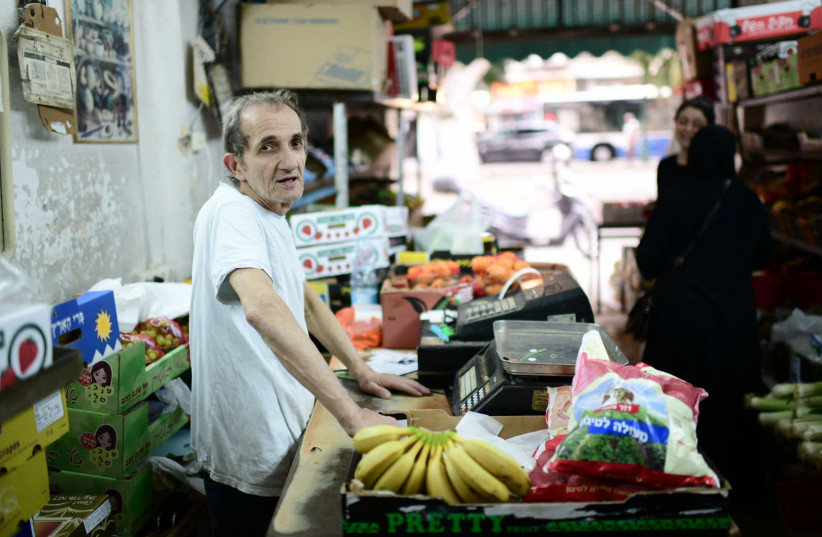 Small business owners of Jerusalem Boulevard in Jaffa, on April 30, 2019. (photo credit: TOMER NEUBERG/FLASH90)