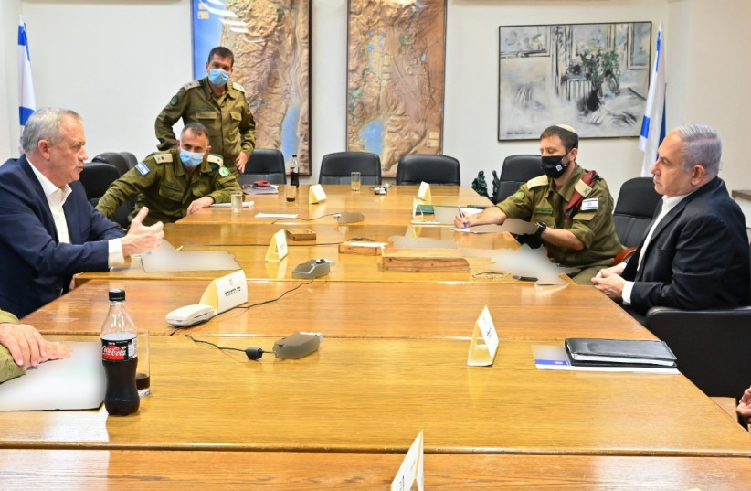 Prime Minister Benjamin Netanyahu and Alternate Prime Minister and Defense Minister Benny Gantz hold discussions after IDF thwarts Hezbollah terror cell infiltration along border with Lebanon (photo credit: IDF SPOKESPERSON'S UNIT)